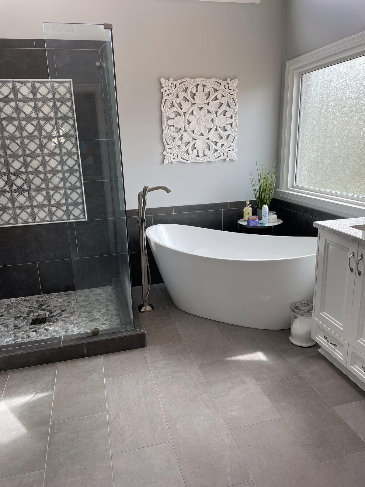 Bathroom tile floor and walls by Peter's Tile