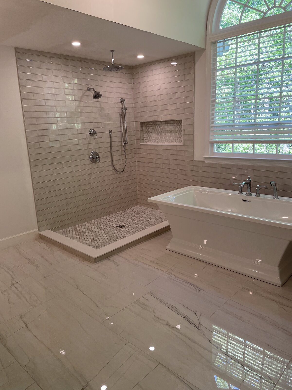 Bathroom tile floor and walls by Peter's Tile
