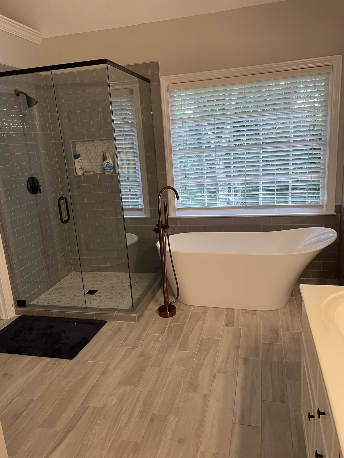 Bathroom tile floor and walls by Peter's Tile