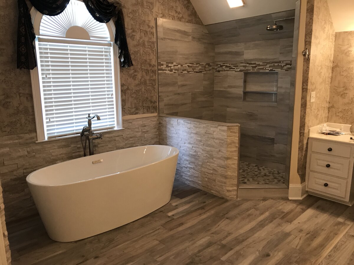 Bathroom tile floor and walls by Peter's Tile