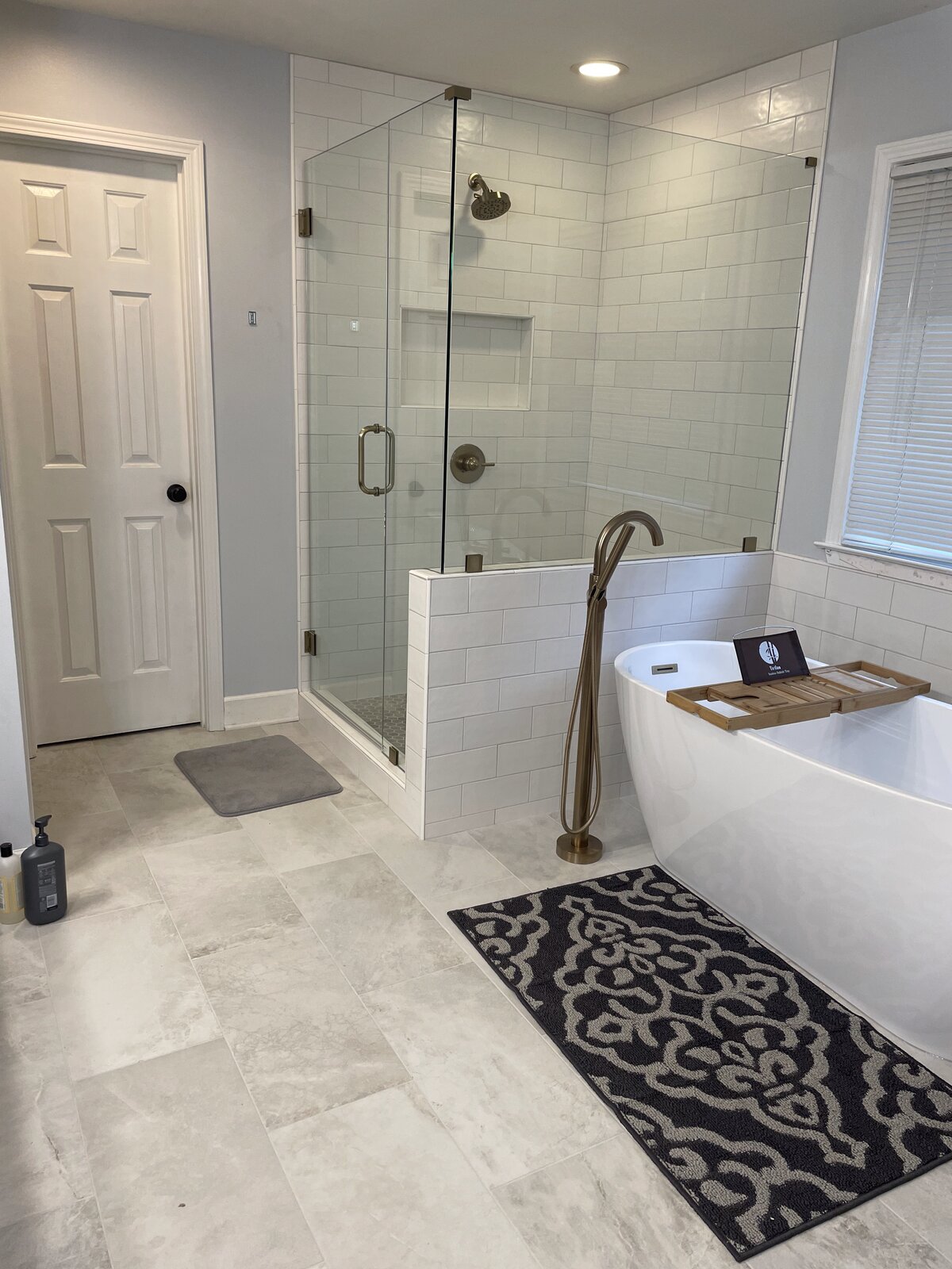 Bathroom tile floor and walls by Peter's Tile
