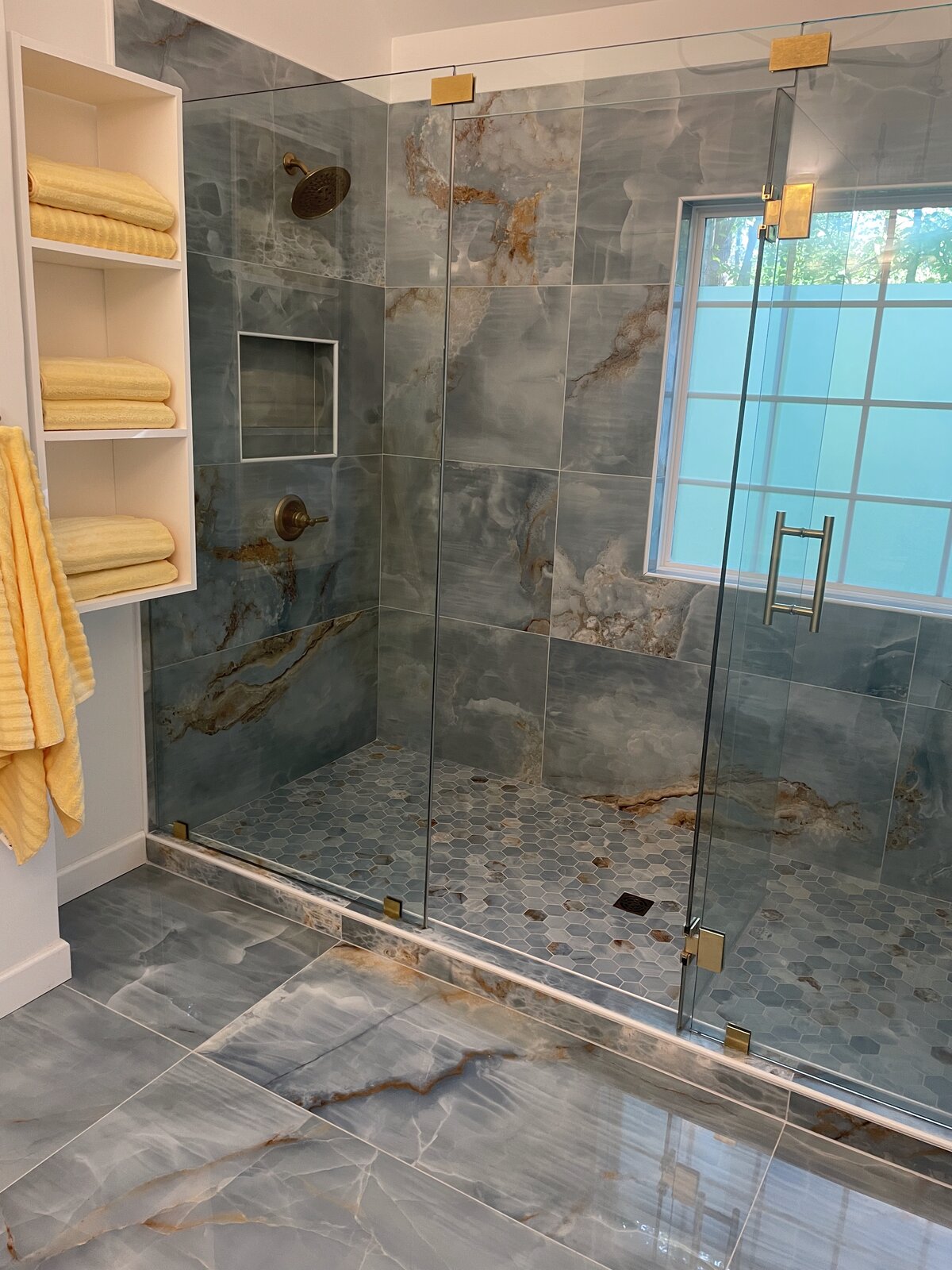 Bathroom tile floor and walls by Peter's Tile