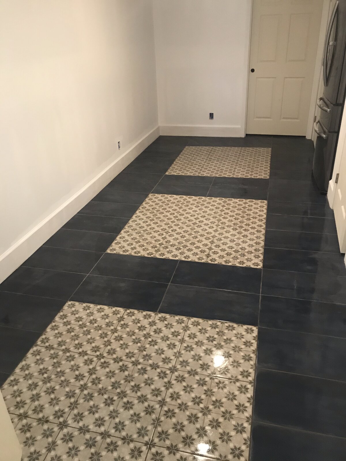 Tile floor installation by Peter's Tile