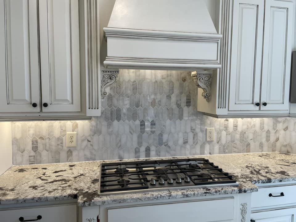 Picket marble kitchen backsplash by Peter's Tile